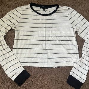 Size medium crop top, not worn very often, slight stain on the front of shirt
